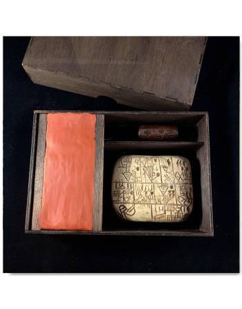 Sumerian writing set including a cylinder seal and a cuneiform writing tablet